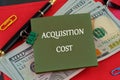 A conceptual phrase on the topic of ACQUISITION COST business. Business concept Royalty Free Stock Photo