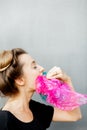 Conceptual portrait of a woman suffocating of plastic bags