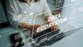 Conceptual representation of data ecosystem with hands typing on laptop showcasing data analysis and digital technology Royalty Free Stock Photo