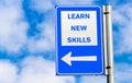 Conceptual road sign about learning new skills Royalty Free Stock Photo