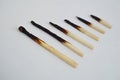 Conceptual set of burnt matches gradually arranged by stages of their incineration