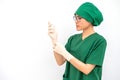 Portrait of Asian nurse raised her hands while wearing rubber gloves in hospital operation room. Ready for work in surgery operati Royalty Free Stock Photo