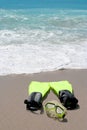 Conceptual snorkeling and swimming gear on beach sand Royalty Free Stock Photo