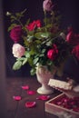 Conceptual Still Life Roses in a Vintage Vase Royalty Free Stock Photo