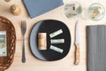 Conceptual studio shot of dinner table with euro bank notes on the plate instead of food. Concept for rising food prices Royalty Free Stock Photo