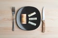 Conceptual studio shot of dinner table with euro bank notes on the plate instead of food. Concept for rising food prices Royalty Free Stock Photo