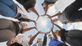 Conceptual symbol of cooperation diverse hands making a circle. Students help each other. Royalty Free Stock Photo