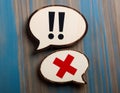 Conceptual symbols representing an argument and disagreement, featuring elements like speech bubbles, exclamation marks, and