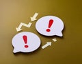 Conceptual symbols representing an argument and disagreement, featuring elements like speech bubbles, exclamation marks, and