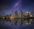 Conceptual view of a modern, illuminated city skyline during night time