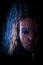 Conceptual view and scene of a young, sensual, beautiful girl, a woman who washes in the shower under a powerful jet of water in Royalty Free Stock Photo