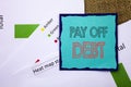 Conceptual writing text showing Pay Off Debt. Concept meaning Reminder To Paying Owed Financial Credit Loan Bills written on Stick