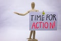 A Conceptual yellow Hand writing caption inscription written sticky note with word Time for action With black ink on a sticky note