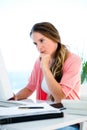 concerned businessWoman staring worriedly at a computer Royalty Free Stock Photo