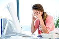 concerned businesswoman staring worriedly at her desk Royalty Free Stock Photo