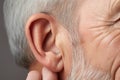 Concerned Man hearing problem closeup. Generate Ai