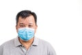 Concerned mature Asian Chinese man with face mask for protection against influenza virus