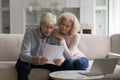 Concerned older couple read received formal notification from bank Royalty Free Stock Photo