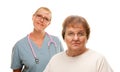 Concerned Senior Woman with Doctor Behind Royalty Free Stock Photo