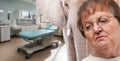Concerned Senior Woman in a Hospital with an Elephant in the Room