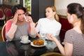 Concerned women chatting in the cafeteria