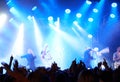 Concert crowd, music festival lights or band audience listen rock, metal or celebrity star, artist or stage performance