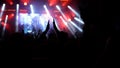 Concert crowd silhouettes in front of bright stage lights. Silhouette of people Royalty Free Stock Photo