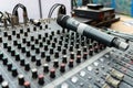 The concert microphone is on the mixing console. concept of sound recording Royalty Free Stock Photo