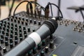 the concert microphone is on the mixing console. The concept of sound recording. Royalty Free Stock Photo