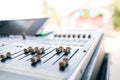 Concert in the Park. Sound mixer control, low angle shot with shallow depth field. Royalty Free Stock Photo