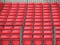 Concert Platform Closeup with Rows of Red Plastic Seats Royalty Free Stock Photo