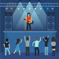 Concert pop group artists on scene music stage night and young rock metall band crowd in front of bright nightclub stage Royalty Free Stock Photo