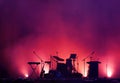 Concert stage on rock festival, music instruments silhouettes, drums and microphones Royalty Free Stock Photo
