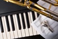 Concert for trombone and piano with instruments and sheet music Royalty Free Stock Photo