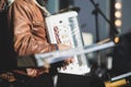 Concert view of accordion player performing on a stage with vocalist and jazz group band orchestra in the background, accordionist Royalty Free Stock Photo