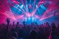 Concertgoers enjoying laser display Royalty Free Stock Photo