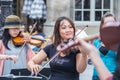 Concertmaster and violinists of Le Marais Performers in Place Co Royalty Free Stock Photo