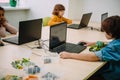 concetrated kids working with computers