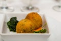 Conch Fritters with Spinach