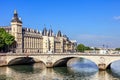 Conciergerie Castle and Bridge of Change over river Seine. Paris, France Royalty Free Stock Photo