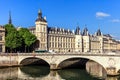 Conciergerie Castle and Bridge of Change over river Seine. Paris, France Royalty Free Stock Photo