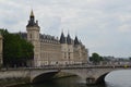 Conciergerie on Ile de France in Paris and bridge Pont au Change in Paris, France Royalty Free Stock Photo