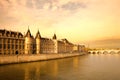 The Conciergerie at Justice Palace and Pont Neuf Bridge over the Seine River, Ile de la Cite, Paris Royalty Free Stock Photo