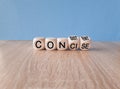 Concise or consistent symbol. Turned wooden cubes