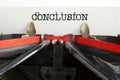 Conclusion is shown using the text on Vintage Typewriter for conclusion presentation Royalty Free Stock Photo