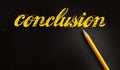 Conclusion word lettering style in yellow on black and pencil besides. Final results business concept or educational Royalty Free Stock Photo