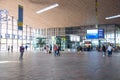 Concourse area inside a large modern railwy station terminal Royalty Free Stock Photo