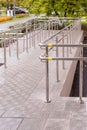 Concret ramp way with stainless steel handrail for support wheelchair disabled people. Health care concept. Copy space Royalty Free Stock Photo