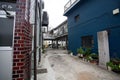 Concrete alleyway surrounded by buildings