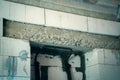 Concrete armored belt above the doorway in the wall of white aerated concrete bricks. Blocked doorway bricked up